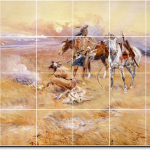 May include: A painting depicting Native Americans on horseback in a desert landscape. The scene is set at sunset, with a hazy orange sky and a distant mountain range. The Native Americans are dressed in traditional clothing and are riding horses with feathered headdresses.