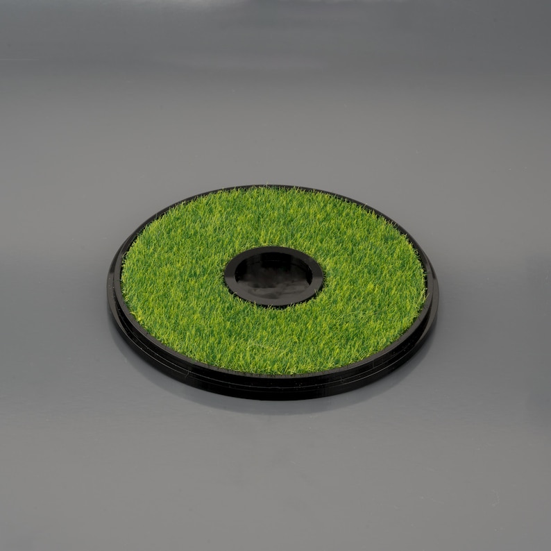 NFL football display stand with a sturdy black base, designed to hold and showcase a full-size American football vertically or horizontally, ideal for sports memorabilia display.