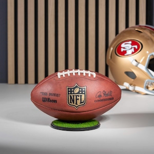 NFL Football Display Stand: Acrylic Base with Authentic Turf