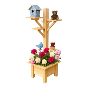 May include: A wooden tree-shaped planter with a birdhouse, shelves, and a flower box. The birdhouse is light blue with white polka dots. The planter is filled with pink, red, and yellow flowers, and has a small teddy bear and a blue bird figurine.