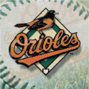 May include: A baseball-themed patch with the Baltimore Orioles logo. The logo features an orange bird with black wings and a white chest, perched on a green diamond with the word "Orioles" in orange text.