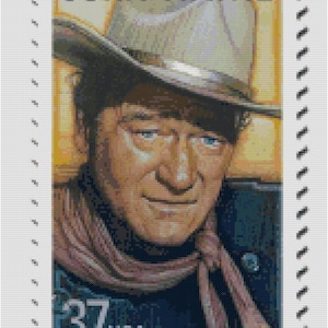 May include: A vintage postage stamp featuring a portrait of John Wayne, a famous American actor, wearing a cowboy hat and a scarf. The stamp is blue and white with the text "37 USA" printed on it.
