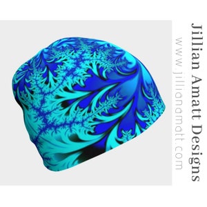 May include: A blue and turquoise beanie with a swirling fractal pattern.