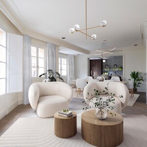 May include: A contemporary living room with cream armchairs, a light rug, and two wooden coffee tables. The room has large windows with white shutters and sheer curtains. A gold chandelier hangs from the ceiling. The words "VIRTUAL Deco Studio" are visible.