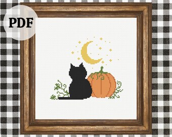 May include: Cross-stitch pattern in a wooden frame featuring a black cat, orange pumpkin, yellow crescent moon, and stars. The word "PDF" is in the upper left corner. The background is a black and white checkered pattern.