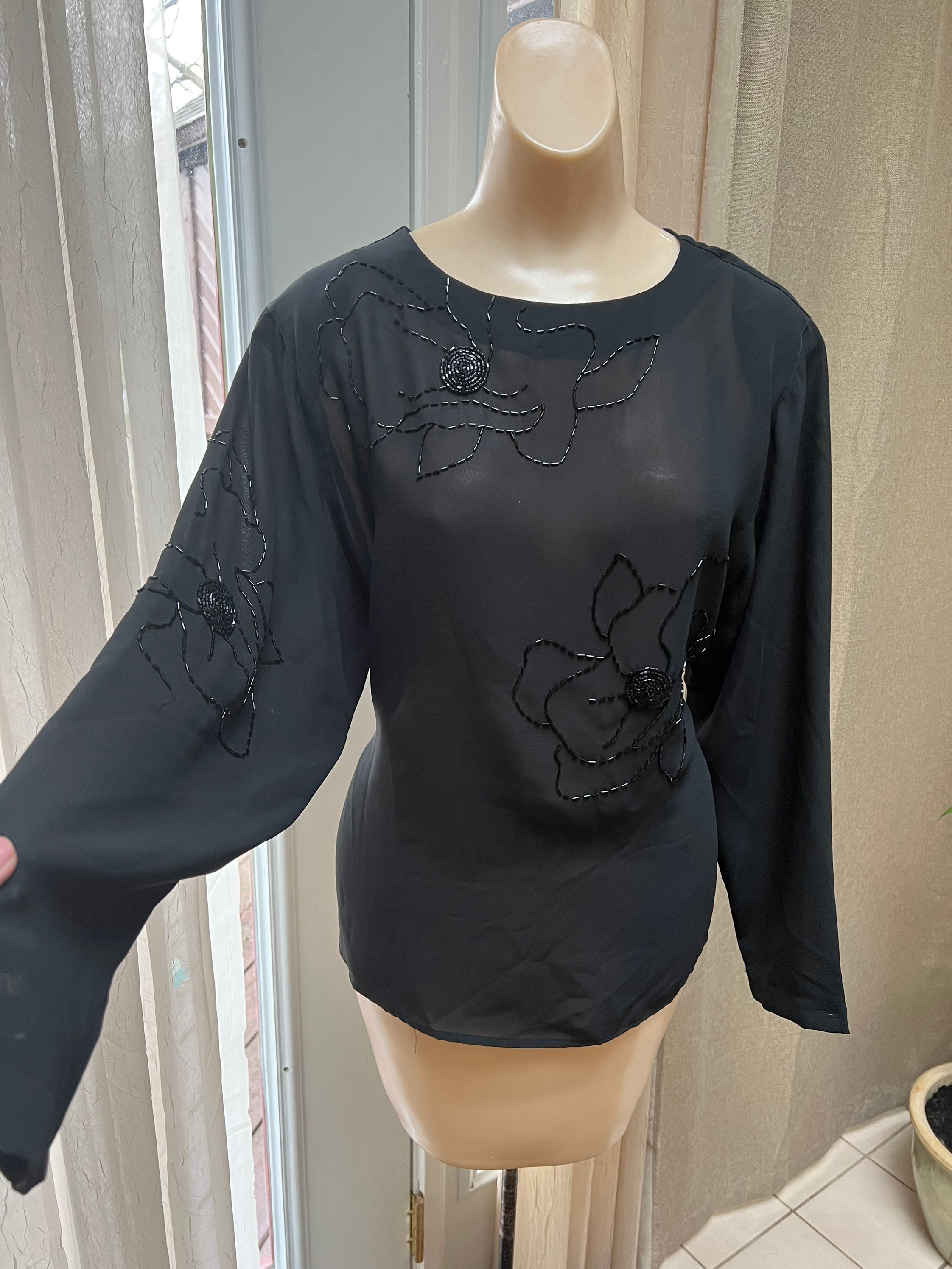 Dressy black tops shop