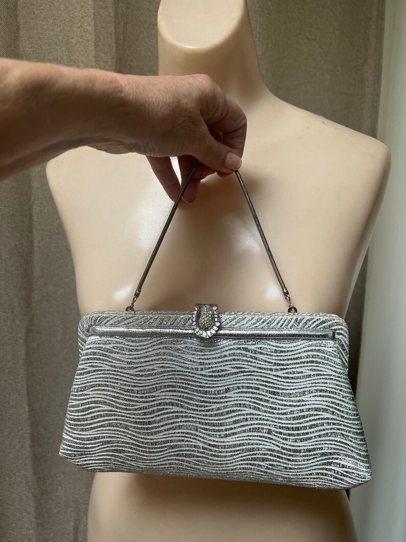 silver clutch bag with handle