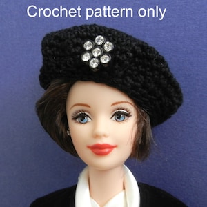 May include: A black crochet beret with a rhinestone flower embellishment. Crochet pattern only.