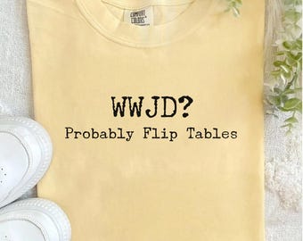 Chemise drôle de WWJD | Tables pliantes probablement | t-shirt humour chrétien de Zazzle.be Liste d'envies Vous avez des idées ? Chemise Faith Comfort Colours | Blague de Jésus sur les tables inversées | Cadeau de l'église