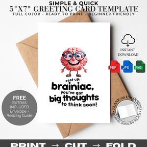 May include: A white 12.7cm x 17.8cm greeting card template featuring a cartoon brain with glasses and the text "rest up, brainiac, you've got big thoughts to think soon!". Includes a brown envelope.