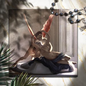 May include: A digital art print featuring a sculpture of two figures in an embrace, one with red wings. A rosary and crucifix are in the upper right corner. The background has a marble texture with shadows.