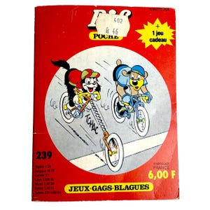 May include: A vintage comic book cover with a red background and a circular illustration of two cartoon animals riding bicycles. The cover features the text "JEUX GAGS BLAGUES" and a price tag.