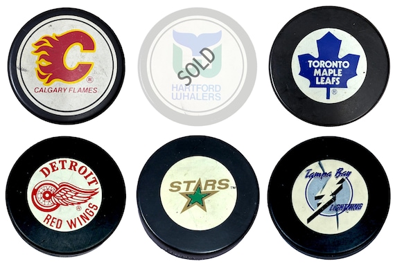 Vintage Official NHL Ziegler Tire Slug Hockey Pucks