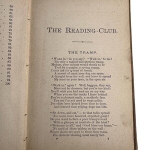 May include: Open book pages with text titled "THE READING-CLUB" and a poem called "THE TRAMP." The pages are aged with a sepia tone. The text is in black, with numbers on the left side of the page.