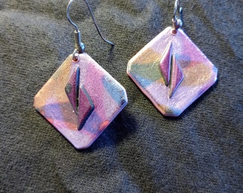Vintage 1990s "Friendly Plastic" earrings.
