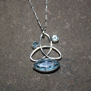Celtic Knot Style Sterling Silver Topaz Pendant Necklace w/chain