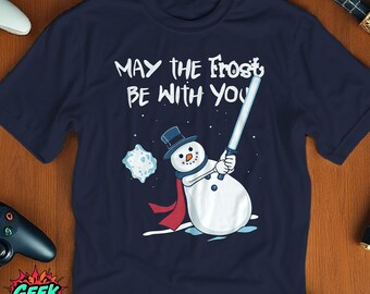 May the Frost Be With You T-Shirt, Navy Tee with Snowman Lightsaber Design, Funny Sci-Fi Holiday Shirt, Christmas Star wars Fan Gift Tee