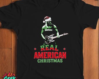 Echt Amerikaans kerst-T-shirt, Hulk Hogan kerstmuts popart T-shirt, groen en rood grafisch kerstshirt, worstelfan vakantiecadeau