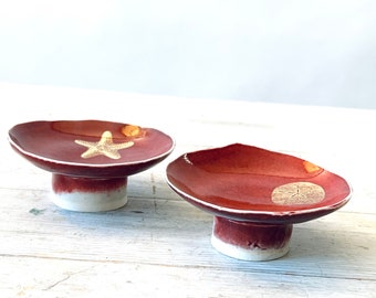 Gift-red glaze- porcelain bowls- red bowls-gold starfish-sea creatures-sand dollar- pedestal bowl-wabi sabi-his and hers-beach, ocean gift