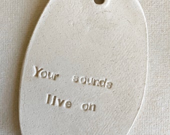Add on custom initials or short phrase added to clapper in wind chimes. Custom logo option too, 4 weeks turnaround.