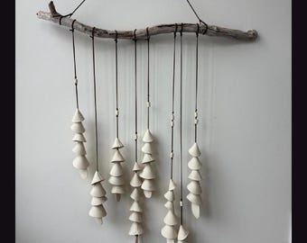 Reserved Custom piece for Beth One white clay large Ceramic wind chime -on drift wood with 7-8 bell strands of 3,4,5,6,7 cones variety.
