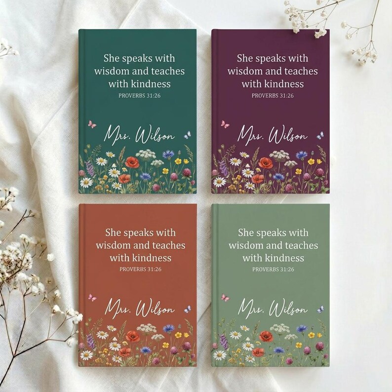 May include: Four hardcover journals in shades of green, burgundy, rust, and sage green. Each journal features the text "She speaks with wisdom and teaches with kindness" and "Mrs. Wilson" with floral and butterfly illustrations.