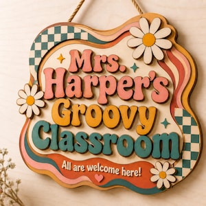 May include: A wooden wall sign with wavy edges featuring the text Mrs. Harper's Groovy Classroom and All are welcome here! The design includes a checkerboard pattern, three white daisies with yellow centers, and orange, pink, and teal accents.