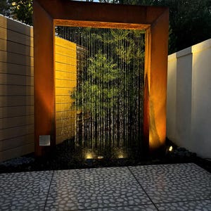 “Door style rain curtain fountain in corten steel — modern outdoor water feature, backyard garden decor, patio fountain for relaxation” “Corten steel rain curtain water feature — peaceful outdoor fountain for backyard, patio, or garden — creates calming waterfall sound” “Luxury corten steel rain curtain fountain — modern door design outdoor water feature for upscale backyard, pool, or garden oasis”