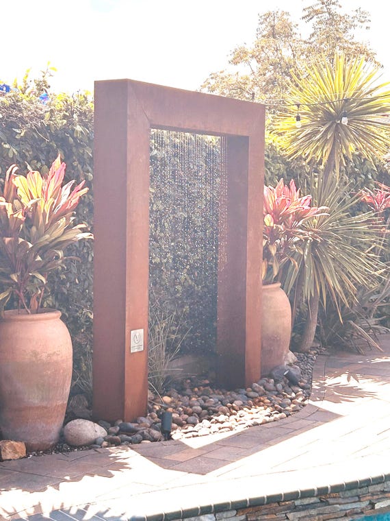 7ft Corten Steel Rain Curtain Water Fountain,Modern outdoor garden water feature.Freight & plumbing Included.Call 858-842-7100 for details.