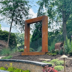 “Door style rain curtain fountain in corten steel — modern outdoor water feature, backyard garden decor, patio fountain for relaxation” “Corten steel rain curtain water feature — peaceful outdoor fountain for backyard, patio, or garden — creates calming waterfall sound” “Luxury corten steel rain curtain fountain — modern door design outdoor water feature for upscale backyard, pool, or garden oasis”