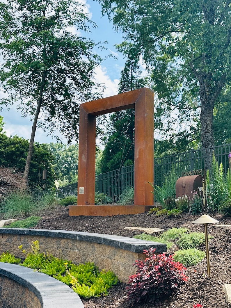 “Door style rain curtain fountain in corten steel — modern outdoor water feature, backyard garden decor, patio fountain for relaxation” “Corten steel rain curtain water feature — peaceful outdoor fountain for backyard, patio, or garden — creates calming waterfall sound” “Luxury corten steel rain curtain fountain — modern door design outdoor water feature for upscale backyard, pool, or garden oasis”