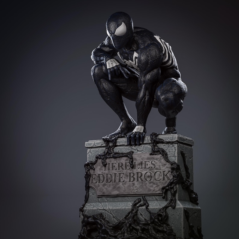 May include: A black and white statue of Venom, a Marvel Comics superhero, crouching on a tombstone. The tombstone reads "Here Lies Eddie Brock".