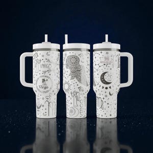 May include: Three white tumblers with handles and straws, featuring black line art designs related to the Virgo zodiac sign. The graphics include celestial motifs, stars, moons, floral elements, and the word Virgo, with the Stanley brand logo visible.