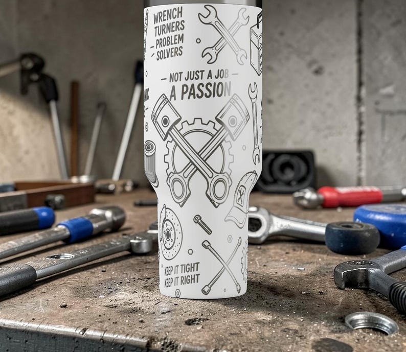May include: A white tumbler with a black and gray mechanic-themed design. The tumbler features wrenches, pistons, and gears, with text that reads "Wrench Turners - Problem Solvers - Not Just a Job - A Passion" and "Keep it Tight, Keep it Right."
