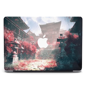 May include: A laptop skin with a colorful image of a Japanese temple and cherry blossoms. The Apple logo is visible in the center of the image.