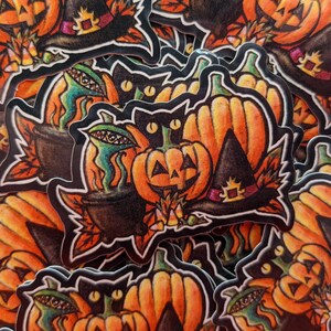 May include: A set of Halloween stickers featuring black cats, cauldrons, pumpkins, and witches hats. The stickers are printed on white paper with a glossy finish.