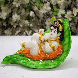 Baby Krishna Statue Bal Gopal Idol Ladoo Gopal on Leaf Statue for Home Decor Makhan Chor Krishna Figure Butter Thief Krishna Sculpture Gift