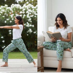 May include: A woman wearing a white t-shirt and light blue floral print pants. The pants have a drawstring waist. The woman is either doing yoga or reading a book. The background includes greenery and a white couch.