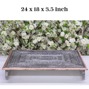 May include: A silver tray with intricate engraved designs and a copper trim. The tray is 24 inches long, 18 inches wide, and 3.5 inches high.