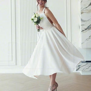 Ivory Cream Halter Neck Midi Dress for Reception Engagement - Minimalist Look for Elegant Dinner or Summer Parties, Bow Details Dress