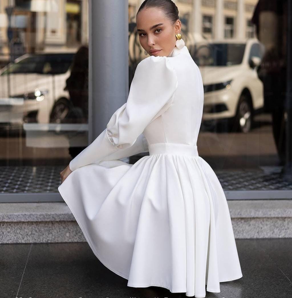 White Short Wedding Dress - Elegant Long Sleeve Choker Neck Mini Dress for Bridal with Flowing Skirt White Short Wedding Dress - Elegant Long Sleeve Choker Neck Mini Dress for Bridal with Flowing Skirt