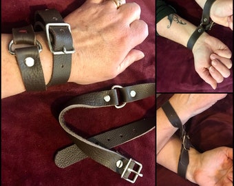 Leather Bracelet Handcuffs Restraint, BDSM, fetish wear. Leather wrap slave bracelet can be used to cuff wrists together