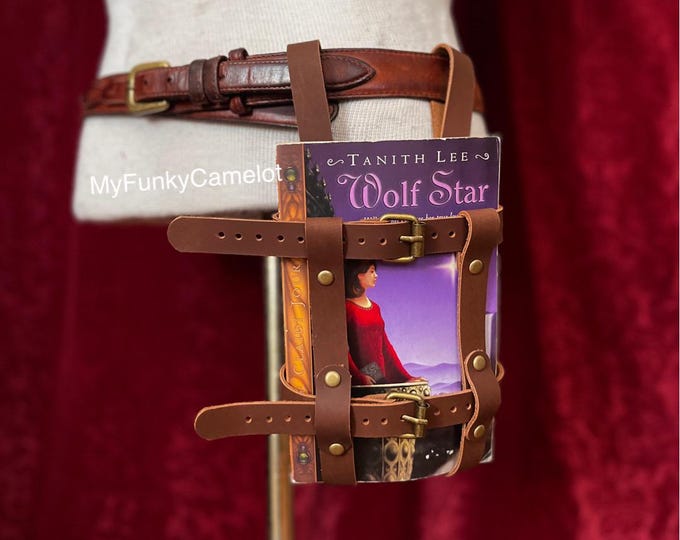 Featured listing image: Book Holster, Leather Strap holster/ for paperback book, journal, cosplay, renfaire Book nerd, reader/ artist gift, cosplay cottage core