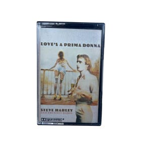スティーブ・ハーレー＆コックニー・レベル・ラブの「プリマドンナ」ヴィンテージカセット、オリジナル1976年レトロアナログテープカートリッジ、象徴的なイギリスのアルバム、レア
