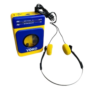 Vintage Yoko Cassette walkman in vibrant yellow with blue
