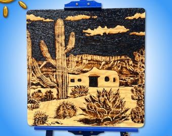 Art pyrogravé dans le désert du sud-ouest : cactus saguaro et paysage en pisé