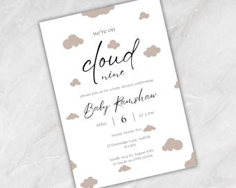May include: A baby shower invitation with the text "we're on cloud nine" in elegant script. The invitation features a light beige cloud design and details for the event, including the date, time, and location.