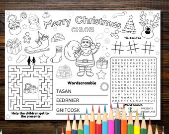May include: A black and white Christmas placemat with a maze, word search, and word scramble. The placemat features Santa Claus, a Christmas tree, and the text "Merry Christmas CHLOE!" Colour pencils are at the bottom.