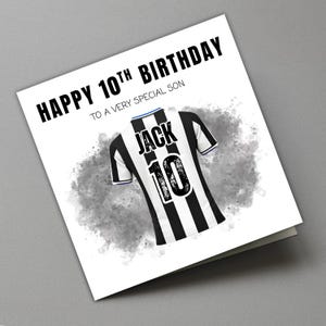 May include: A birthday card with the text "HAPPY 10TH BIRTHDAY TO A VERY SPECIAL SON" in black. The card features a black and white striped soccer jersey with the name "JACK" and the number "10" on the back. The background has a gray watercolor effect.
