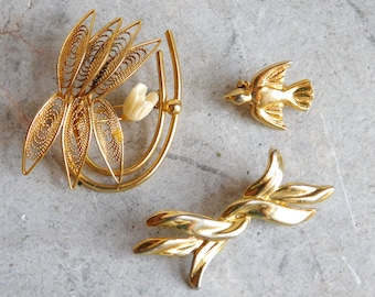 Vintage Mid-Century Goldtone Brooches Lot of 3 - 1 is Cannetille with Carved Bone Rose - 1 Small Dove - 1 Stylized Leaves - 1960s-1970s